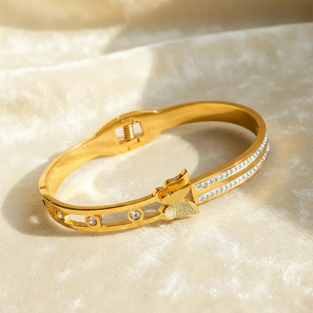 Dazzle Link Bracelet is a stylish gold bracelet for women, crafted with a sleek linked design and sparkling stone accents.