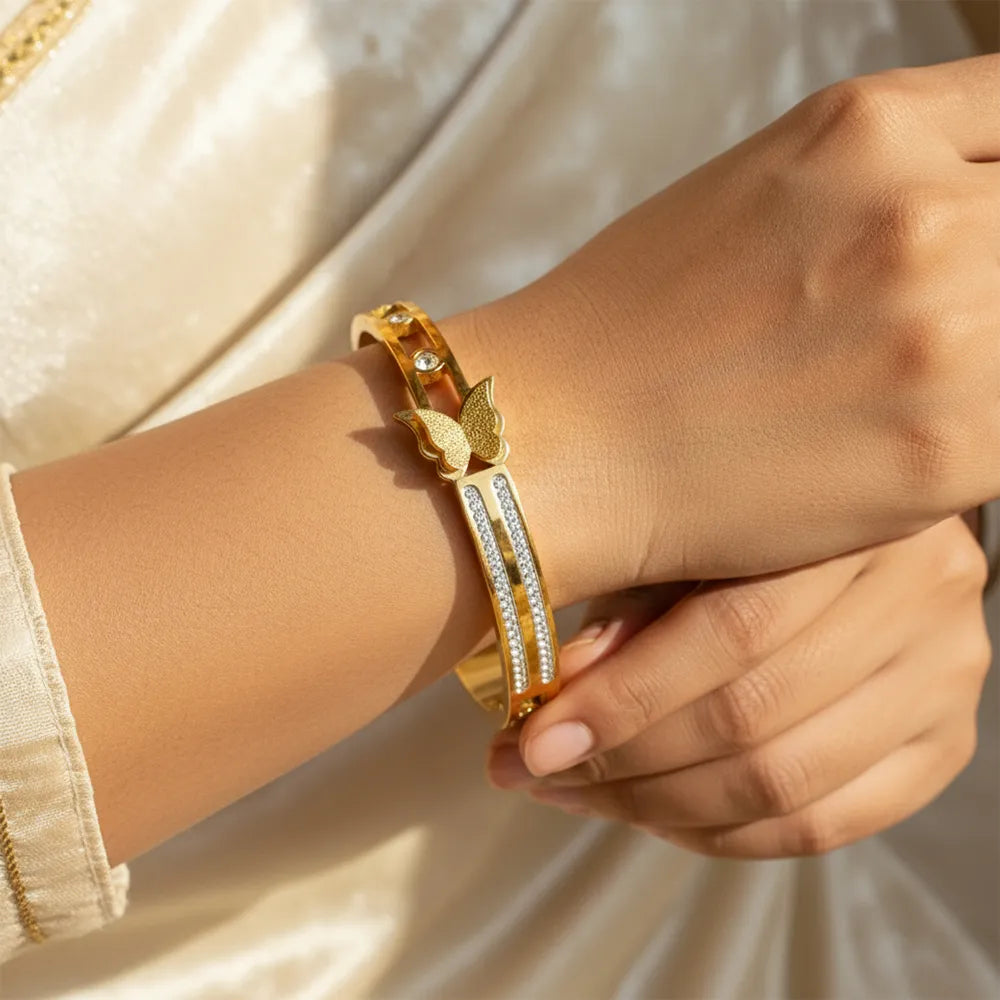 Dazzle Link Bracelet is a stylish gold bracelet for women, crafted with a sleek linked design and sparkling stone accents.