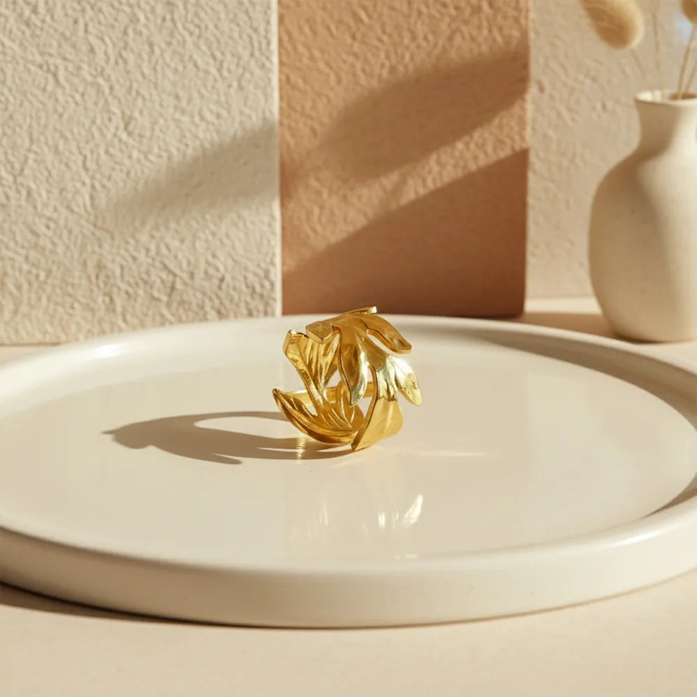 This golden swirl ring features a unique twisted design with Adjustable pattern.