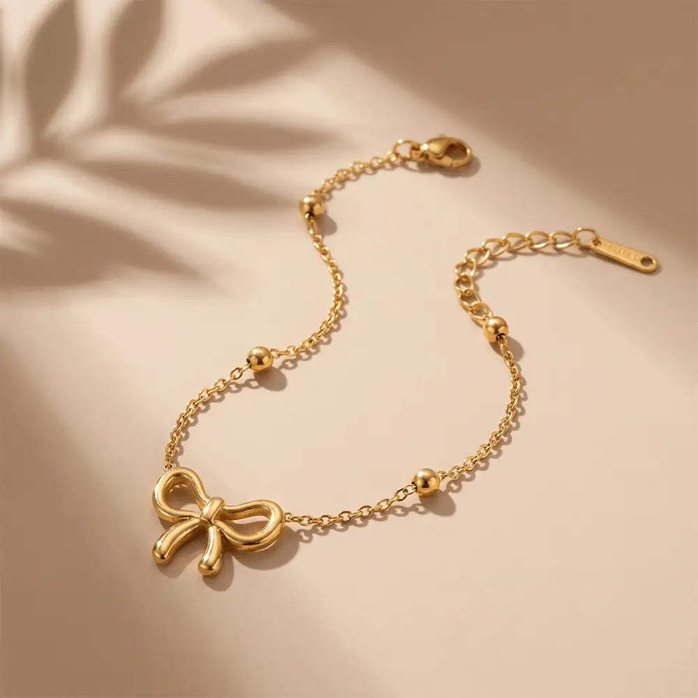 Elegant Bow Charm Bracelet in Anti Tarnish Stainless Steel