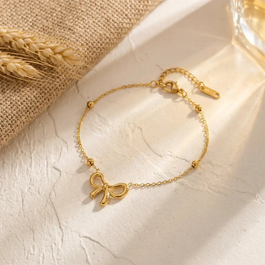 Adjustable Anti Tarnish Bow Chain Bracelet in Gold Finish