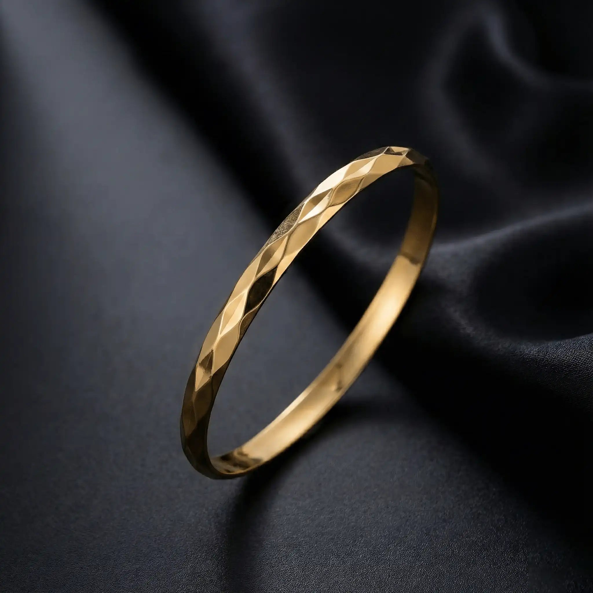 2 Diamond Cut Bangle anti-tarnish gold bangle styled on dark luxury background