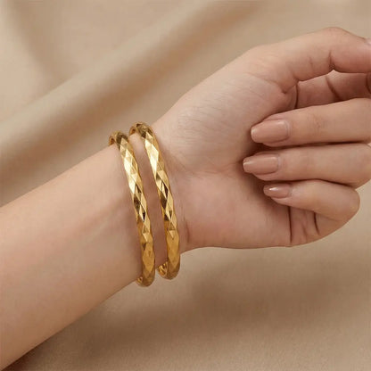 Model Wearing Ka Trends Diamond Cut Gold Bangles Pair