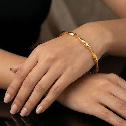 2 Swirl Gold Bangle anti-tarnish twisted gold bangle worn on wrist