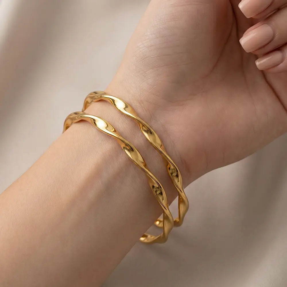 K-A Trends Swirl Gold Bangles on Wrist – Anti Tarnish Twisted Bracelet Pair