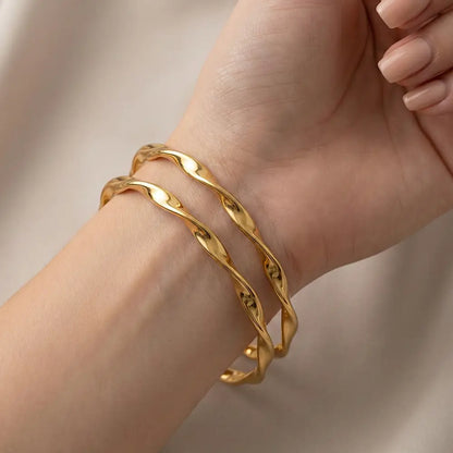 K-A Trends Swirl Gold Bangles on Wrist – Anti Tarnish Twisted Bracelet Pair