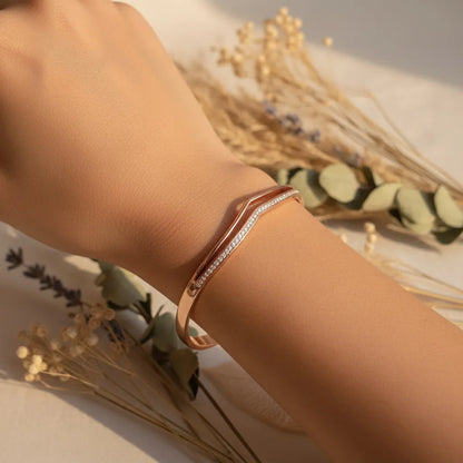 Rose gold blush curve bracelet with clear crystals