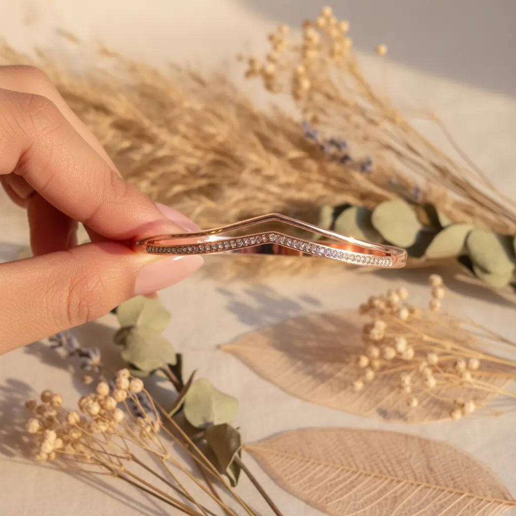 Rose gold blush curve bracelet with clear crystals