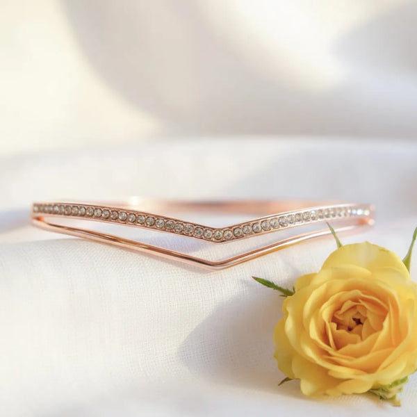 Rose gold blush curve bracelet with clear crystals