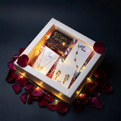Butterfly Love Valentine hamper with anti-tarnish butterfly pendant necklace, matching earrings, Dark Fantasy chocolates, and fairy lights, arranged in a premium white gift box with rose petals.