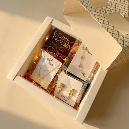 Open Butterfly Love Valentine gift box showcasing anti-tarnish butterfly jewellery set, chocolates, and decorative fairy lights in a luxury white hamper.