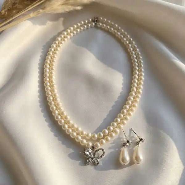 Butterfly pearl necklace set with double strand pearls and matching pearl drop earrings