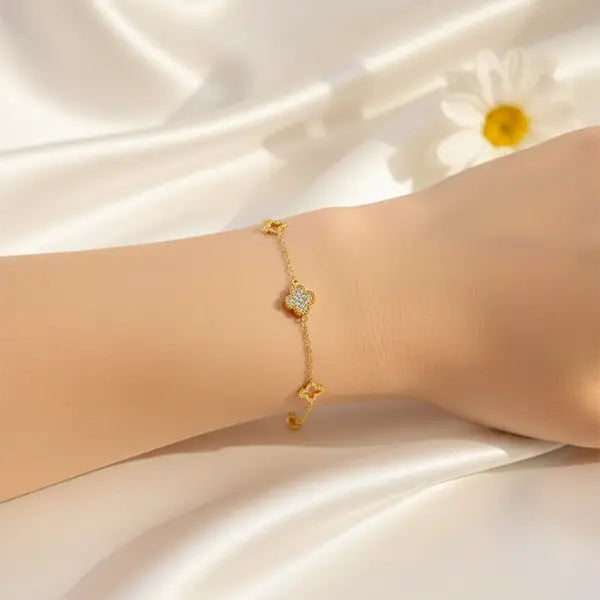 Charm Link Bracelet worn on wrist with gold finish, featuring delicate floral charm design, anti-tarnish jewellery for everyday wear