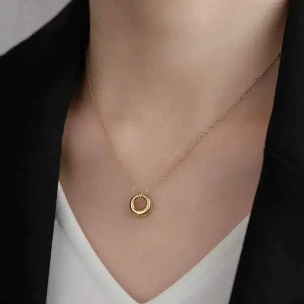 Classic Circle Pendant Necklace – elegant gold circle charm worn on model for minimalist everyday style