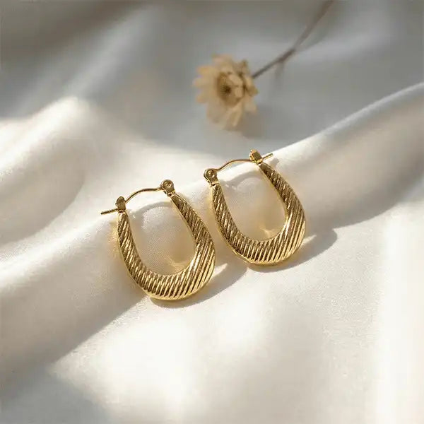 Classic Textured Hoops Anti-Tarnish earrings on white satin background