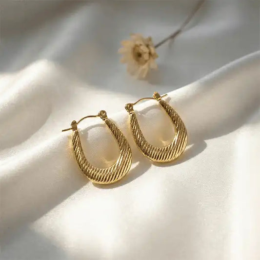 Classic Textured Hoops Anti-Tarnish earrings on white satin background