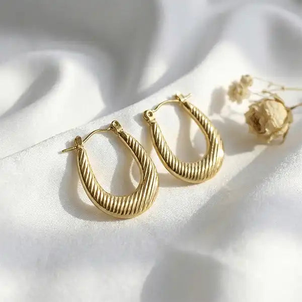 Classic Textured Hoops Anti-Tarnish gold earrings with soft sunlight
