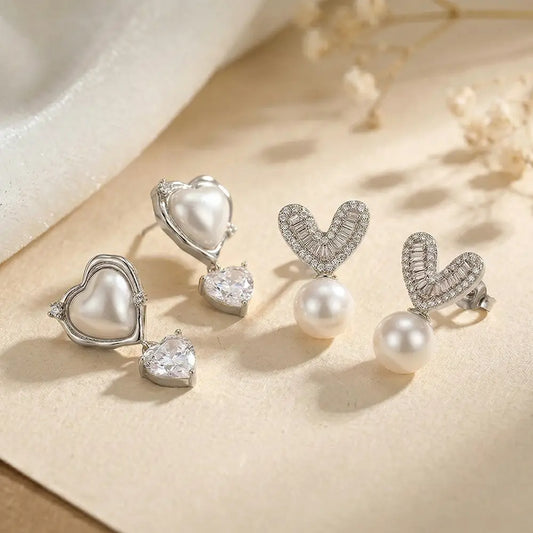 K-A Trends anti tarnish silver heart and pearl stud earrings combo with cubic zirconia stones premium jewellery flatlay