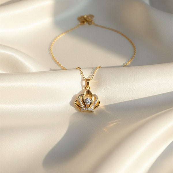 Crystal Crown Pendant anti-tarnish gold crown necklace styled on white fabric