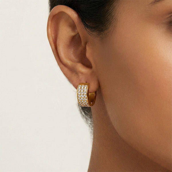 Model wearing gold crystal huggie hoop earrings – anti-tarnish daily wear jewellery