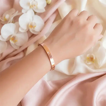 Rose gold anti-tarnish crystal bracelet worn on wrist, minimal elegant cuff bracelet for women
