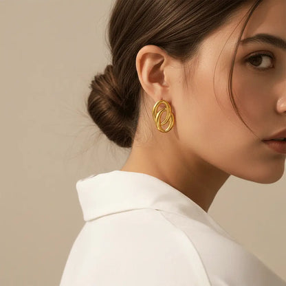 K-A Trends anti tarnish gold double loop earrings worn by female model elegant minimalist lifestyle jewellery look