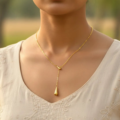 Gold-plated drop pendant necklace with sleek teardrop design, minimal gold jewellery for women suitable for any outfit or occasion.