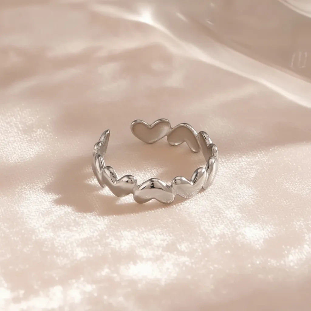 This Heart Ring is a timeless piece made with premium anti-tarnish metal. The cute heart pattern and adjustable open design make it perfect.
