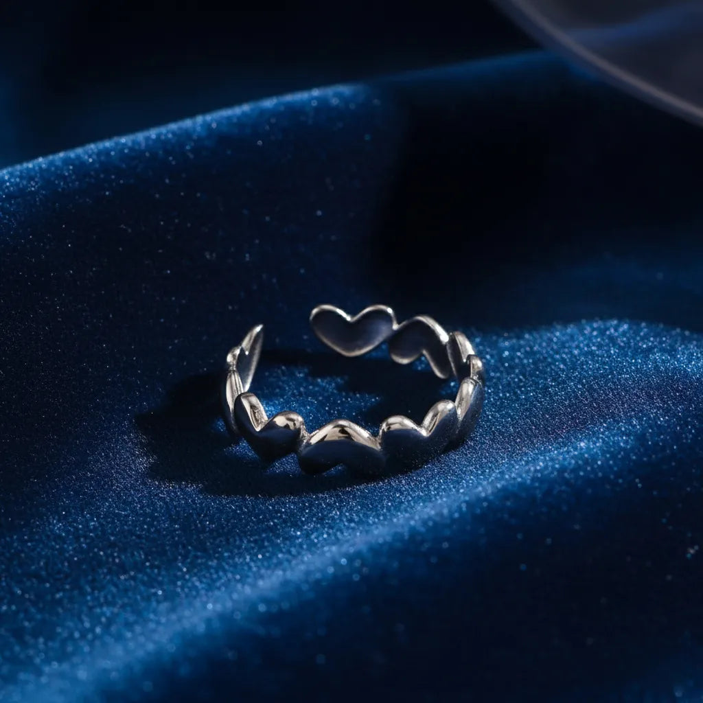 This Heart Ring is a timeless piece made with premium anti-tarnish metal. The cute heart pattern and adjustable open design make it perfect.
