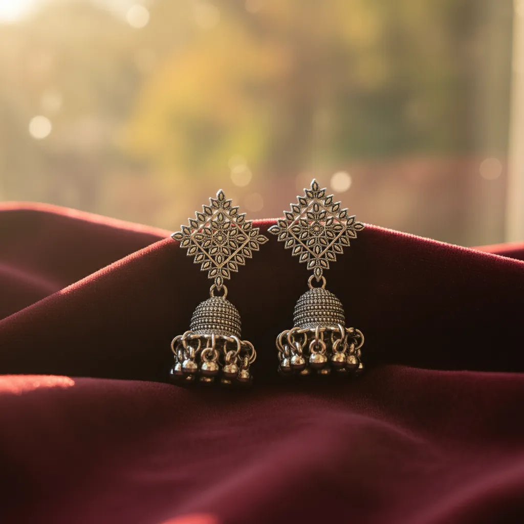 Ornate Square Jhumkas are made from high-quality oxidized metal, which feature intricate square patterns with delicate jhumka drops. 