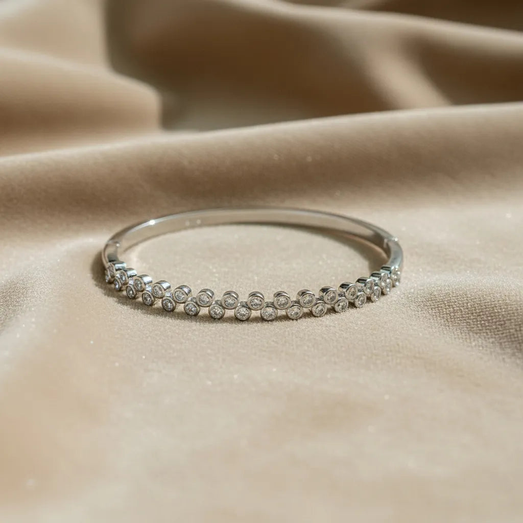 A stunning silver-toned anti tarnish bracelet with brilliant round-cut stones that shine from every angle