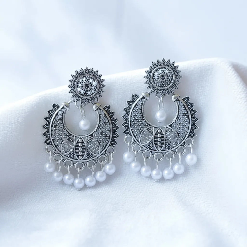 Noor Baali Jhumka is a beautiful pair of oxidized silver earrings 