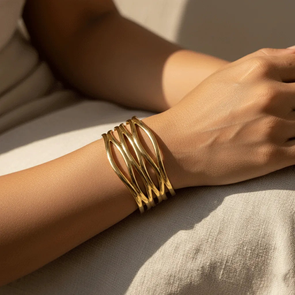 This Golden Spiral Cuff for women, designed with multiple twisted loops that gives a classy look. 