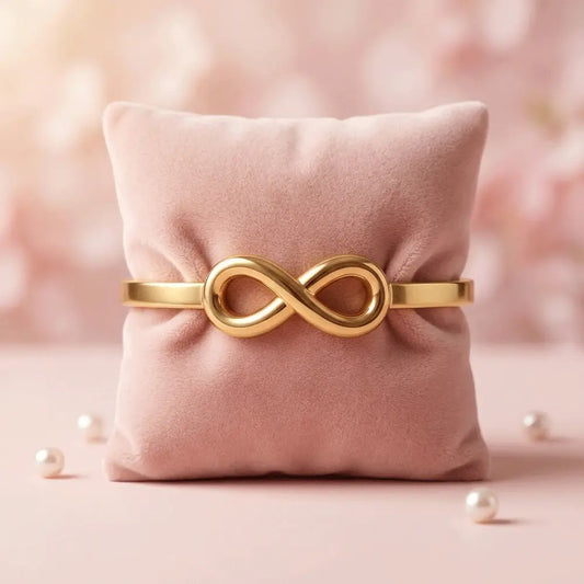 Gold infinity bracelet on soft pink cushion, minimal anti-tarnish kada bracelet for women, elegant everyday jewellry