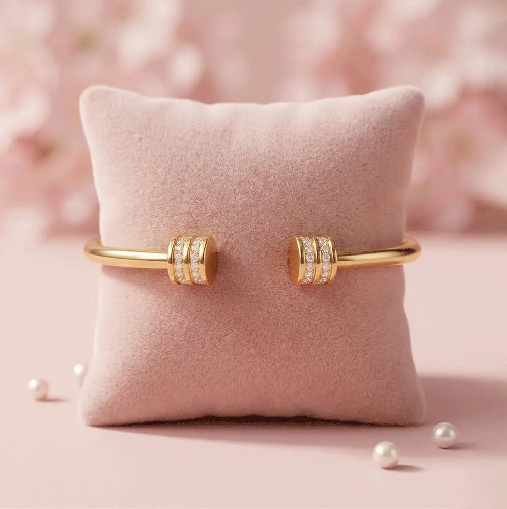 Gold open cuff kada bracelet with crystal bands on soft pink cushion, anti-tarnish jewellery for women, K-A Trends