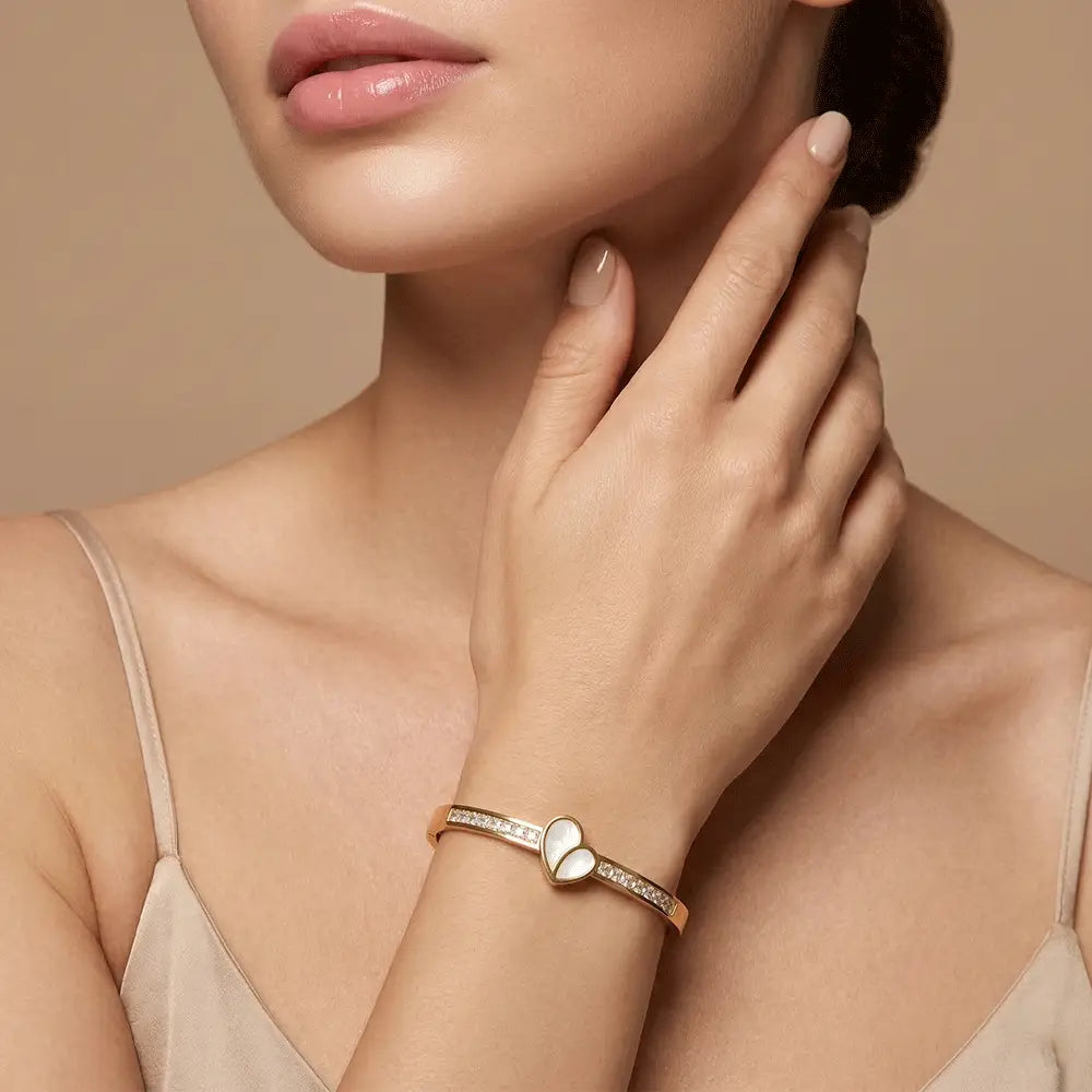 Woman wearing gold heart bracelet with crystal accents, elegant anti-tarnish bracelet for daily wear, K-A Trends jewellery