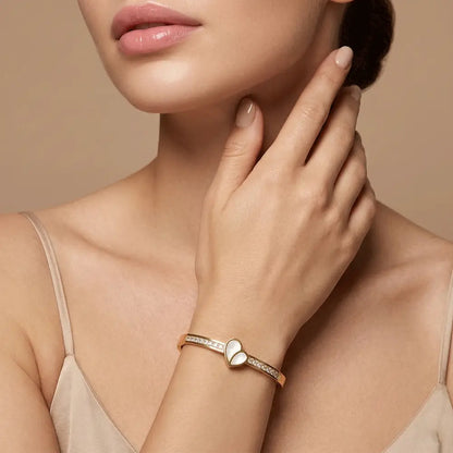Woman wearing gold heart bracelet with crystal accents, elegant anti-tarnish bracelet for daily wear, K-A Trends jewellery