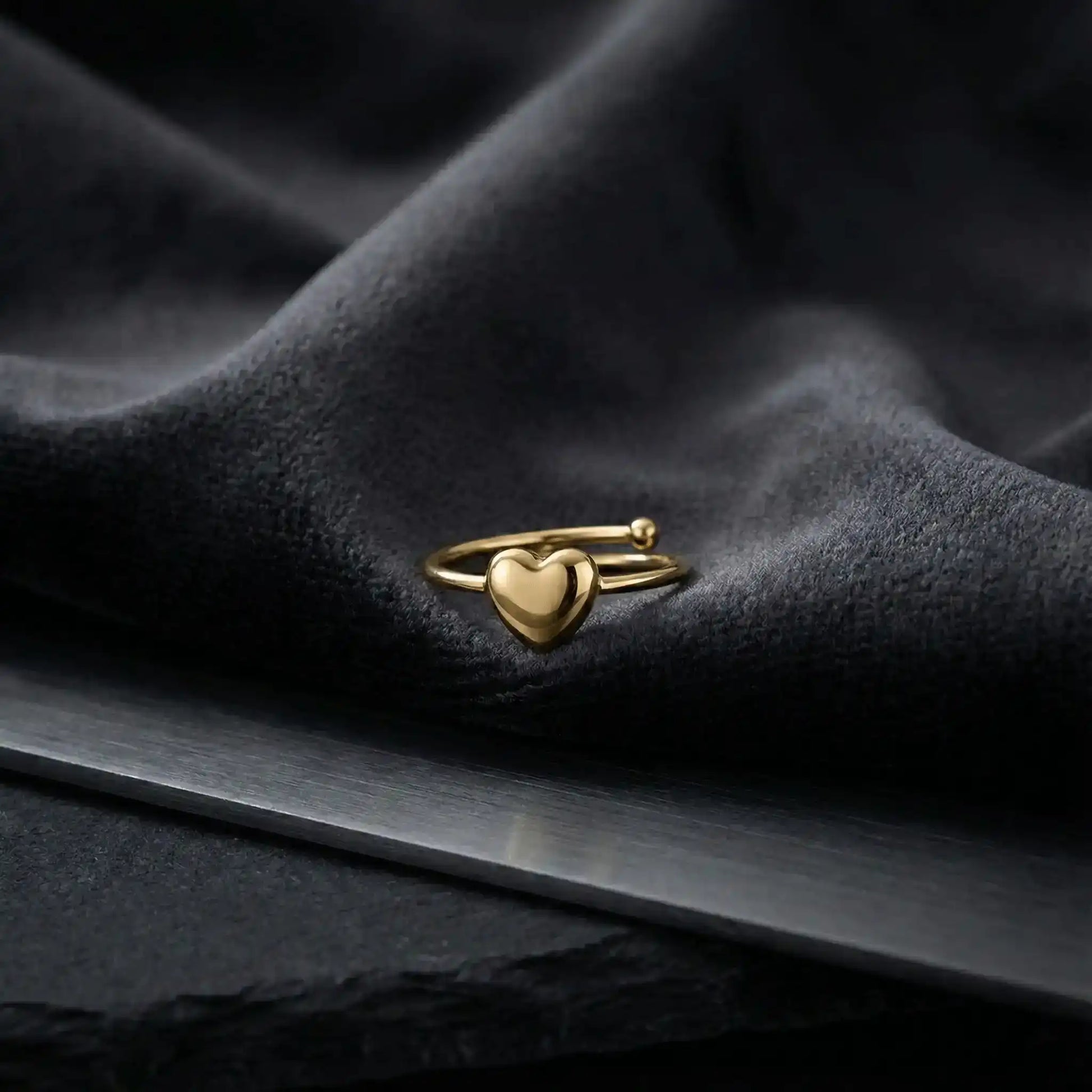 Heart Pop Ring anti-tarnish gold heart ring styled on black luxury fabric