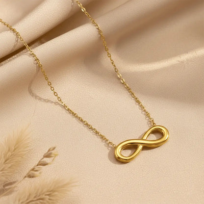 K-A Trends anti tarnish gold infinity pendant necklace on beige fabric premium minimalist jewellery