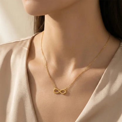 K-A Trends anti tarnish gold infinity pendant necklace worn by female model elegant minimalist lifestyle jewellery look