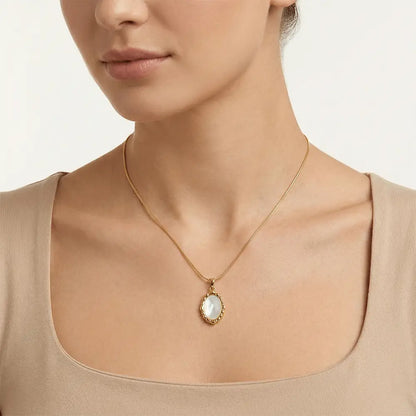 Model wearing ivory frame pendant necklace in polished gold finish, anti tarnish everyday jewellery by K-A Trends