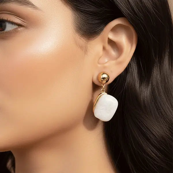 Model wearing ivory stone drop earrings – lightweight anti-tarnish designer jewellery