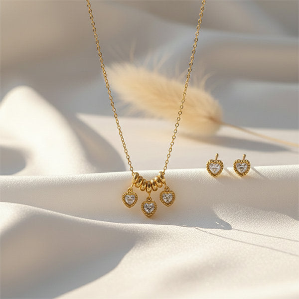 Little Heart Glow Set anti-tarnish gold heart necklace and earrings set flatlay