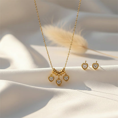 Little Heart Glow Set anti-tarnish gold heart necklace and earrings set flatlay