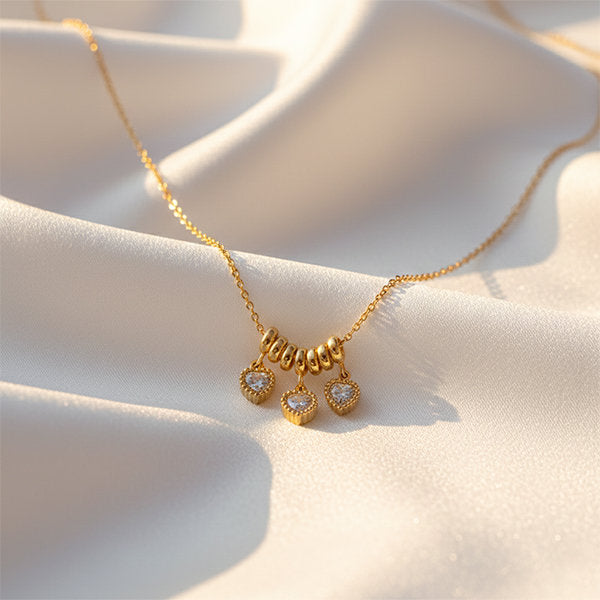 Little Heart Glow Set anti-tarnish gold heart necklace jewellery flatlay