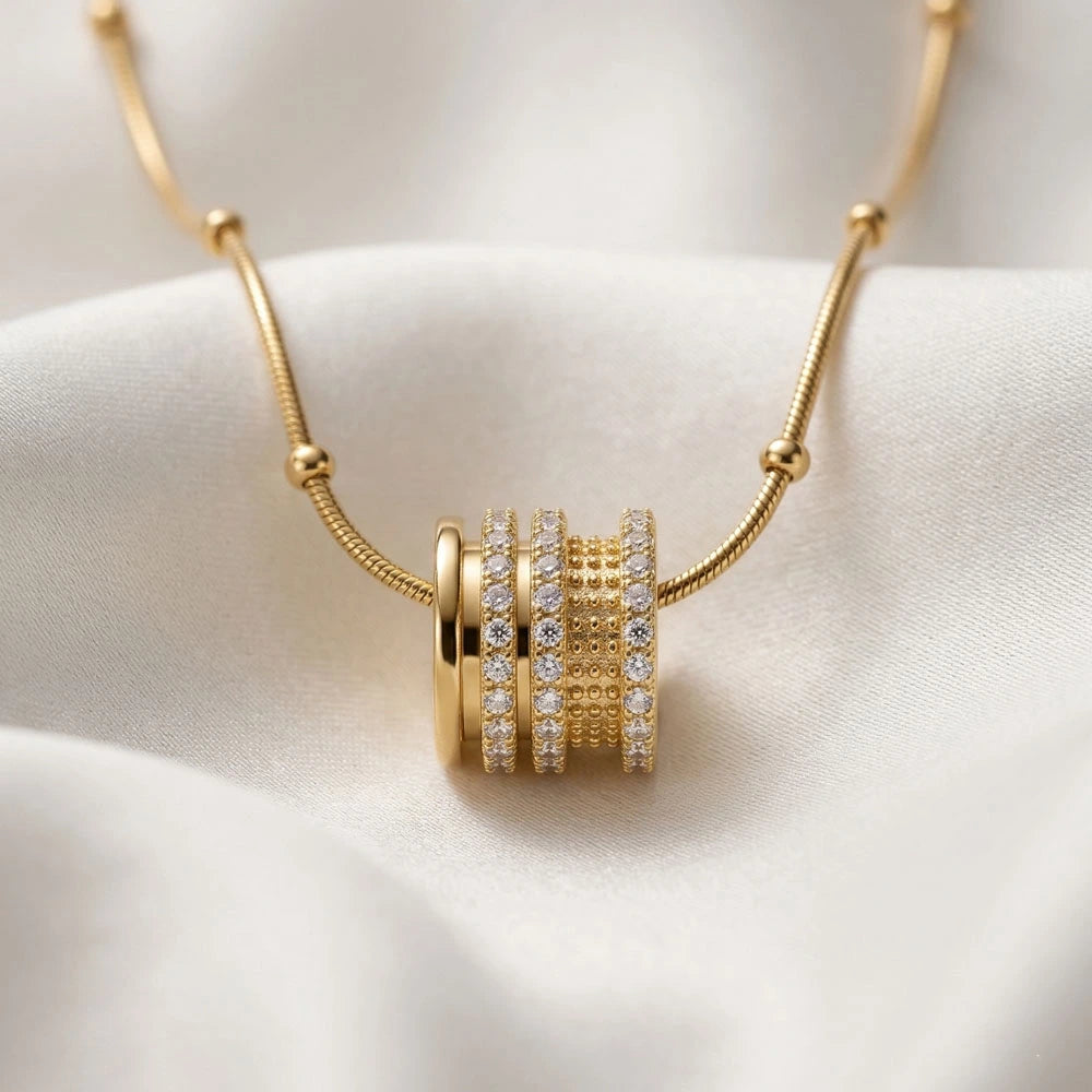 Luxe Cylinder Pendant - Anti-Tarnish on a light fabric background