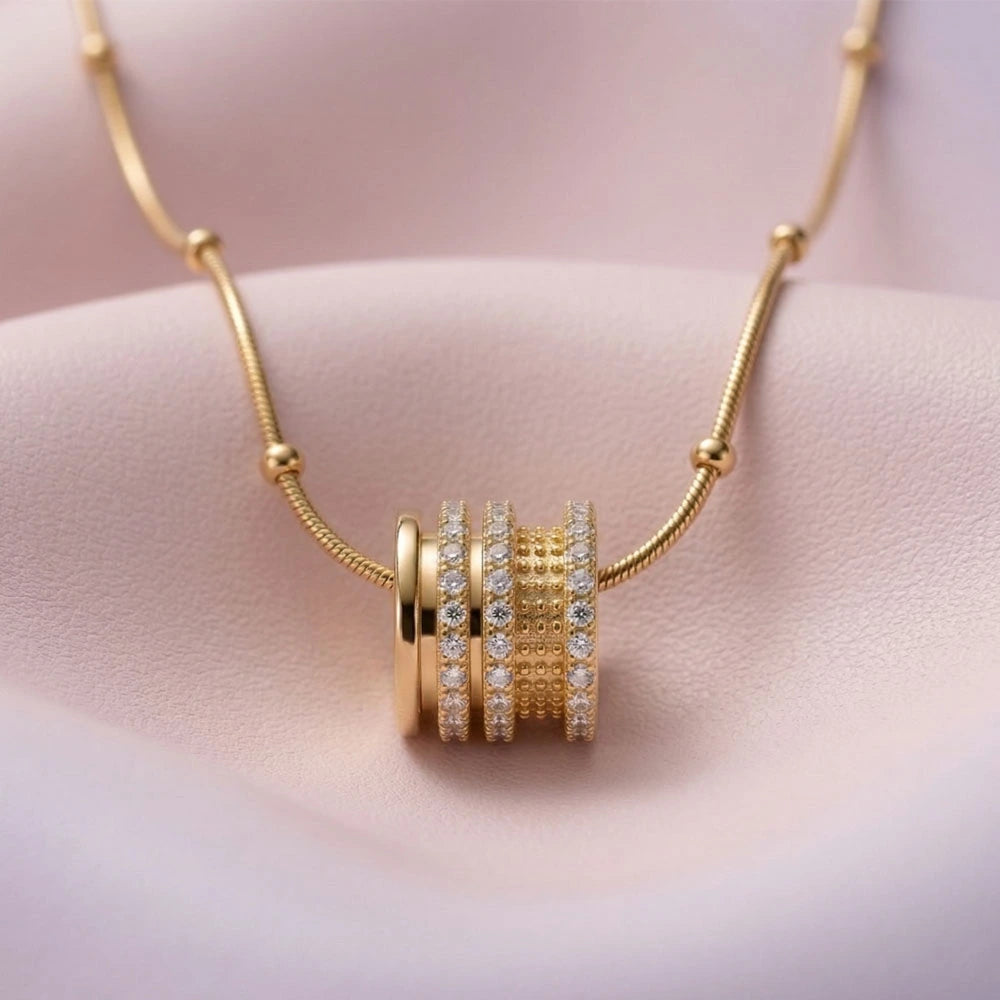 Luxe Cylinder Pendant - Anti-Tarnish on a soft pink background