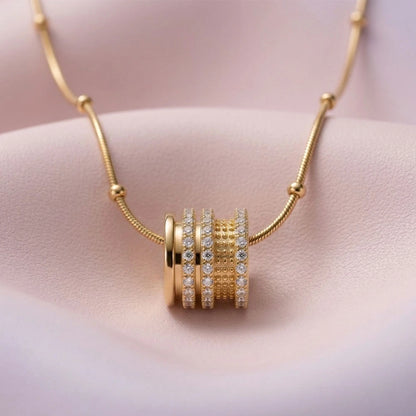 Luxe Cylinder Pendant - Anti-Tarnish on a soft pink background