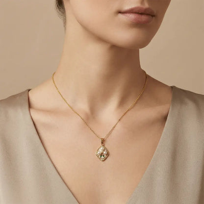 Model wearing pearl bloom pendant in gold finish, anti tarnish elegant necklace for women