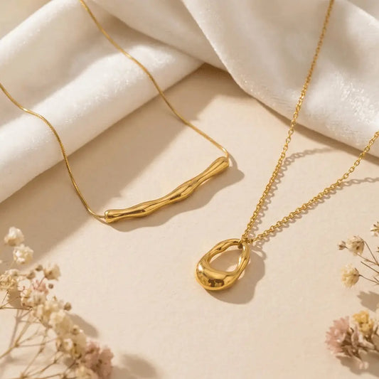 K-A Trends anti tarnish gold statement pendant necklace set featuring abstract bar pendant and organic loop pendant minimalist jewellery